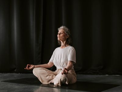 Close up of hands in a mudra position